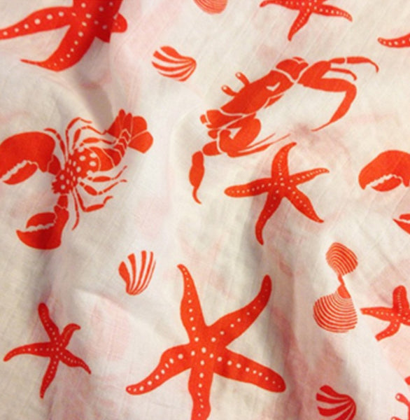 Organic Cotton Muslin Swaddle in Coral Crustacean